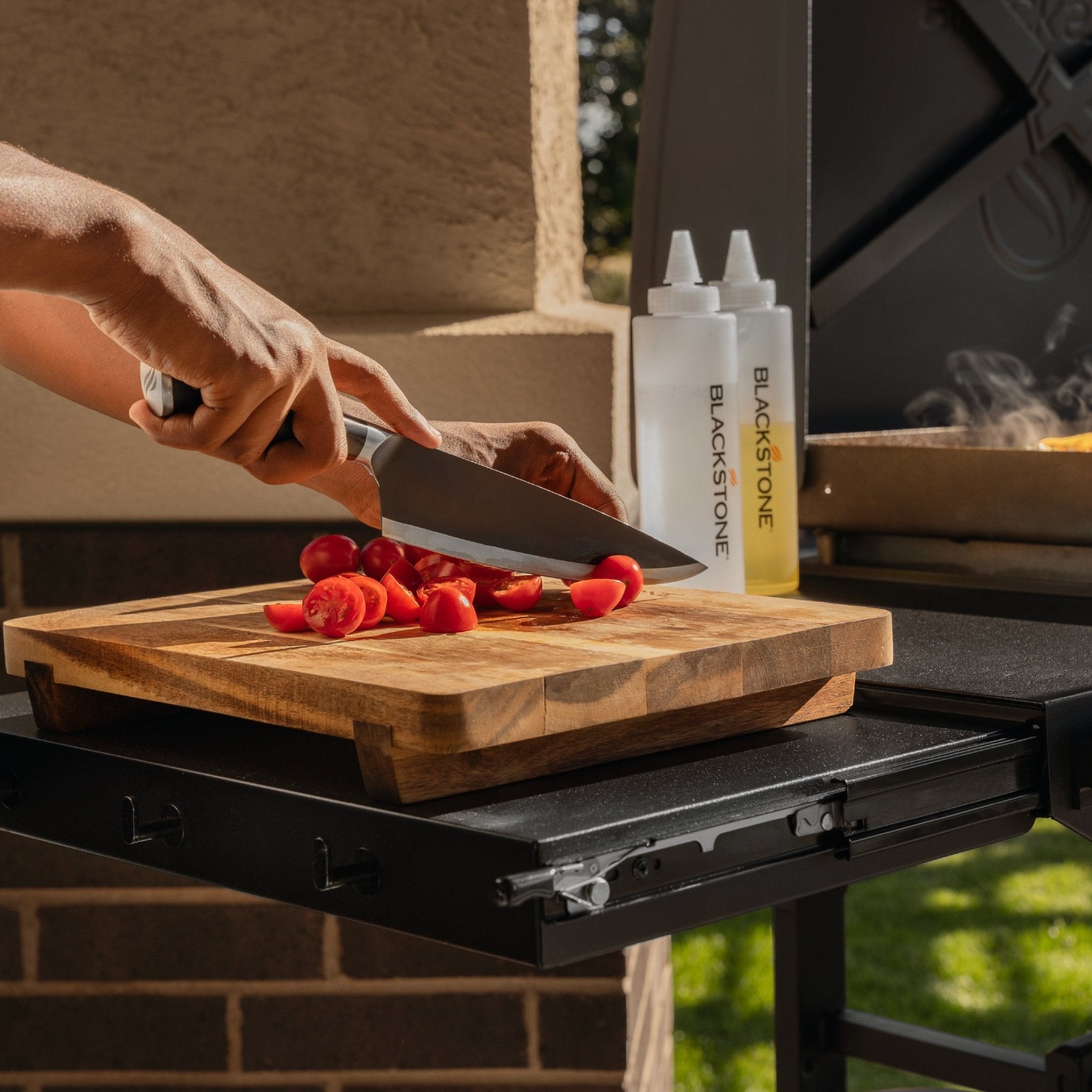 The extendable side shelf provides extra prep space, so you never have to leave the action.