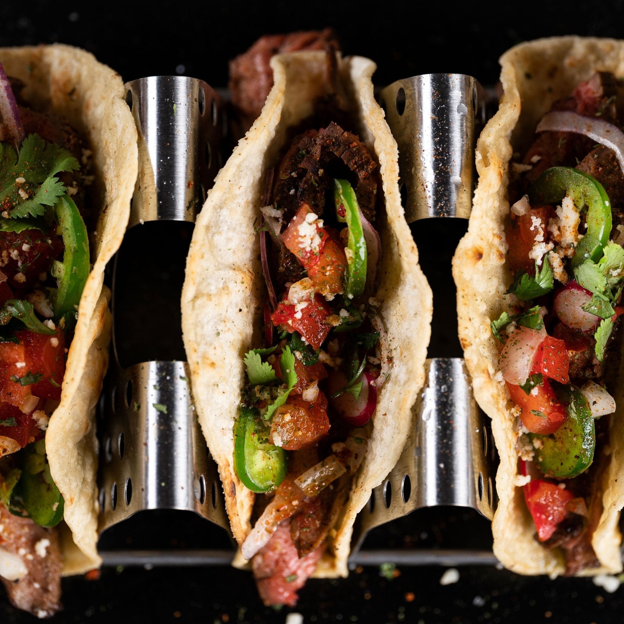 Overhead image of tacos sitting in the taco rack.