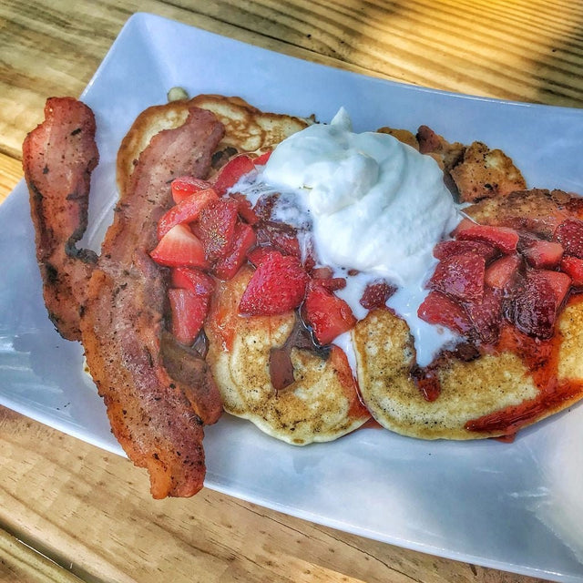 Bacon Pancakes with Strawberry Whiskey Syrup and Whipped Cream - Blackstone Products