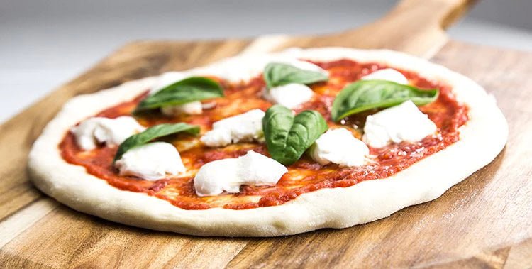 Best Tips For Stretching, Building, And Launching A Pizza At Home - Blackstone Products