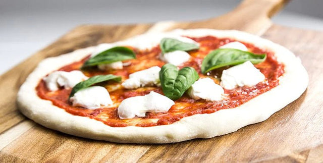 Best Tips For Stretching, Building, And Launching A Pizza At Home - Blackstone Products