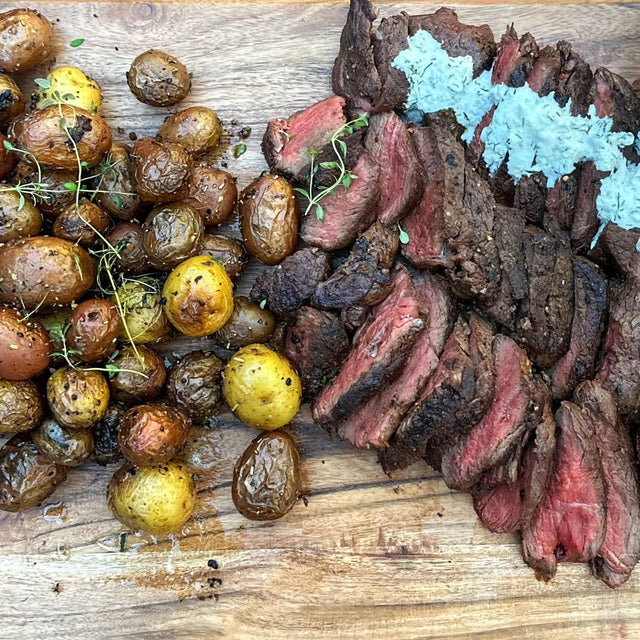 Bison Top Sirloin with Creamy Horseradish Dill Sauce and Herbed Potatoes - Blackstone Products