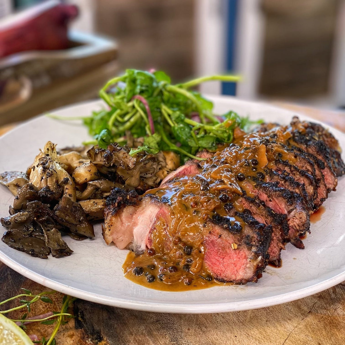 Blackened Ribeye with Creamy Peppercorn Sauce - Blackstone Products