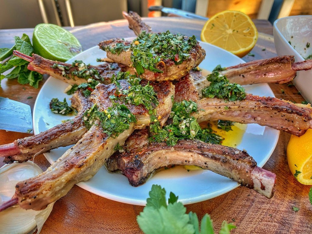 Succulent grilled lamb lollipops with mint chimichurri