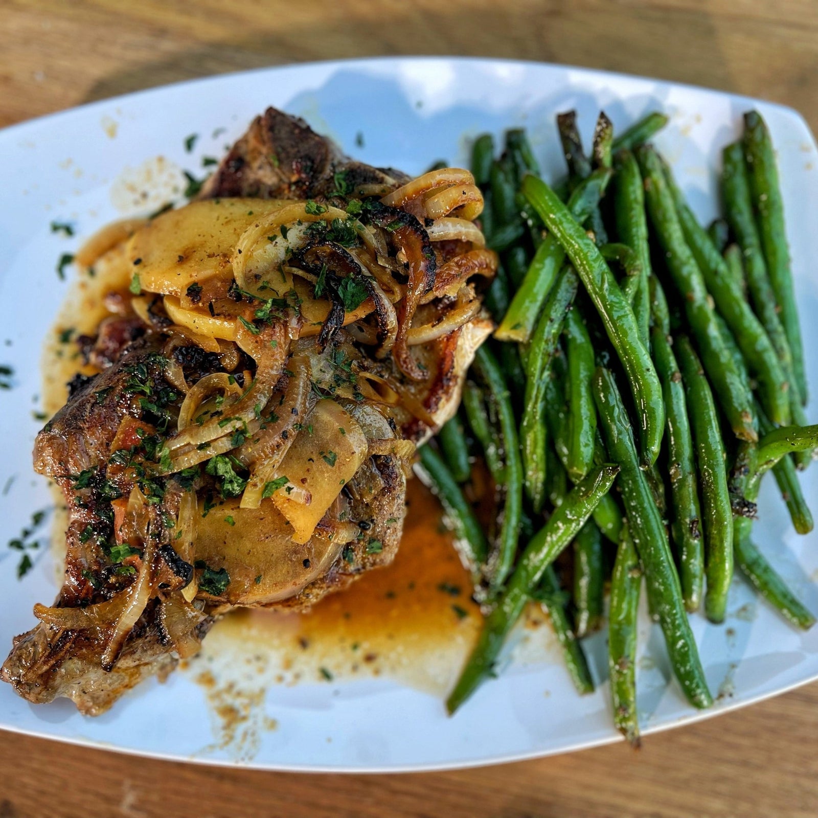 Seared Pork Chops with Apple and Onion Sauce - Blackstone Products