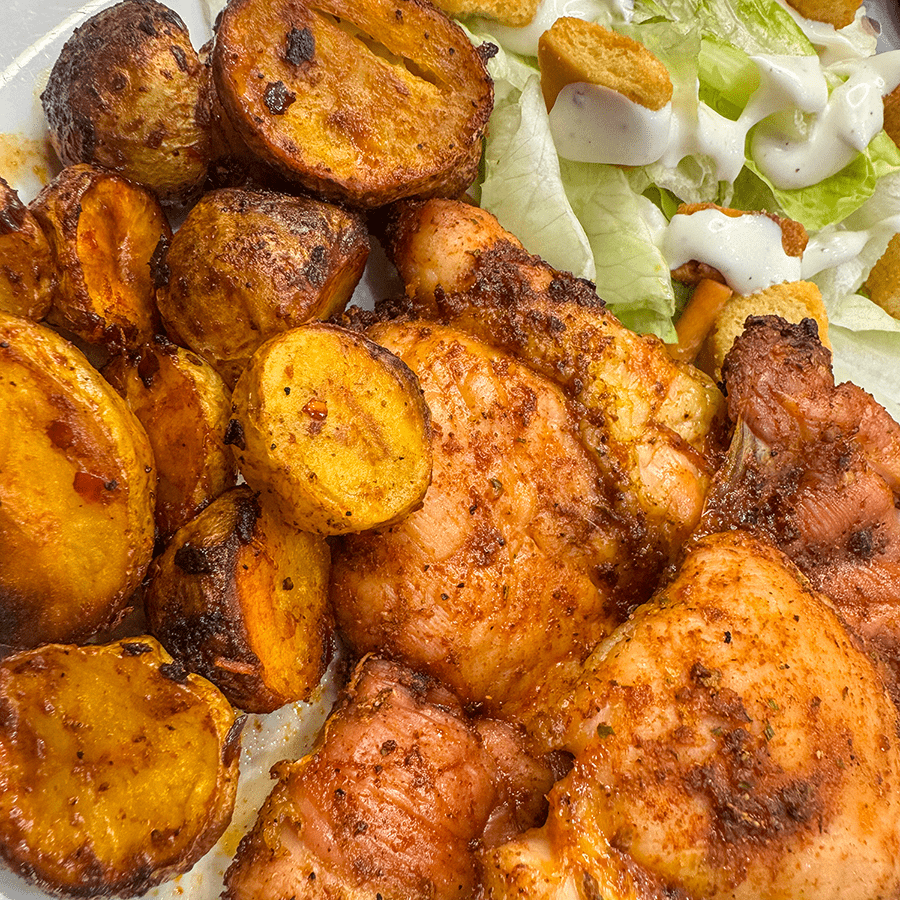 Smoked Chicken Thighs with Potatoes - Blackstone Products