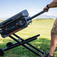 Simply pull up and lock the griddle in place when you're ready to cook. 