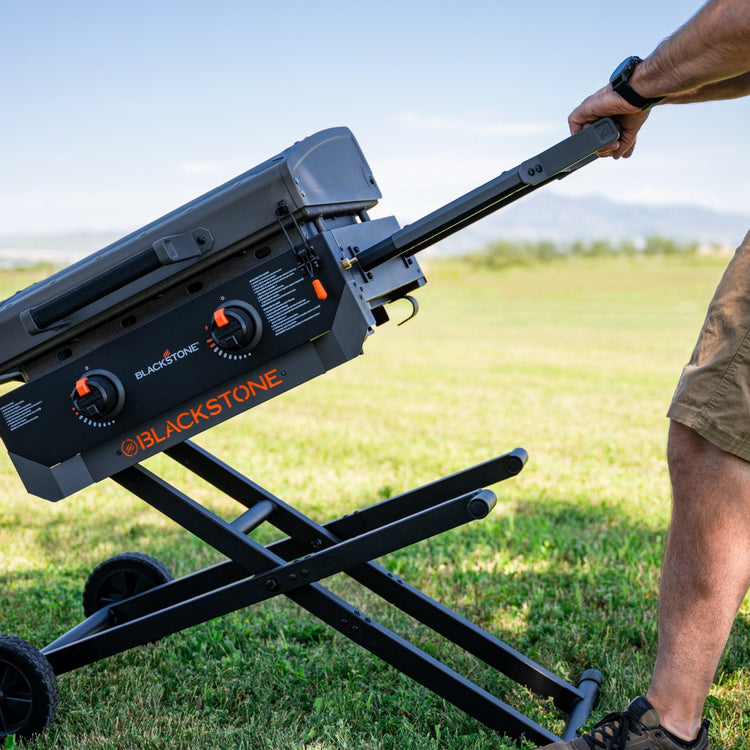 Simply pull up and lock the griddle in place when you're ready to cook. 