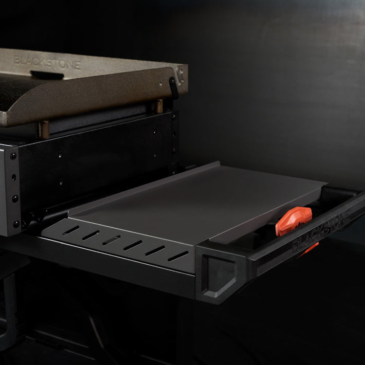 The handle doubles as a side shelf for extra prep space. 