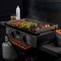 Cook steak, veggies, and potatoes all at once with the independently controlled heat zones. 