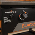 The electric push-button ignition easily fires up the griddle. 