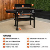 The griddle features an Omnivore Griddle Plate, Rear Grease Management, protective hard cover, side shelf tool hooks, BAR System with accessory bin, electric push-button ignition, fixed caster wheels, and a soft cover and spatulas. 