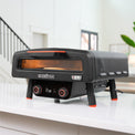 Bring the pizza party inside with the Electric Tabletop Pizza Oven. 