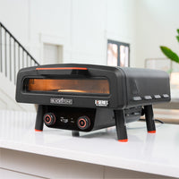 Bring the pizza party inside with the Electric Tabletop Pizza Oven. 