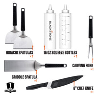The toolkit includes 2 hibachi spatulas, 2 16 ounce squeeze bottles, 1 carving fork, 1 griddle spatula, and 1 8 inch chef knife. 
