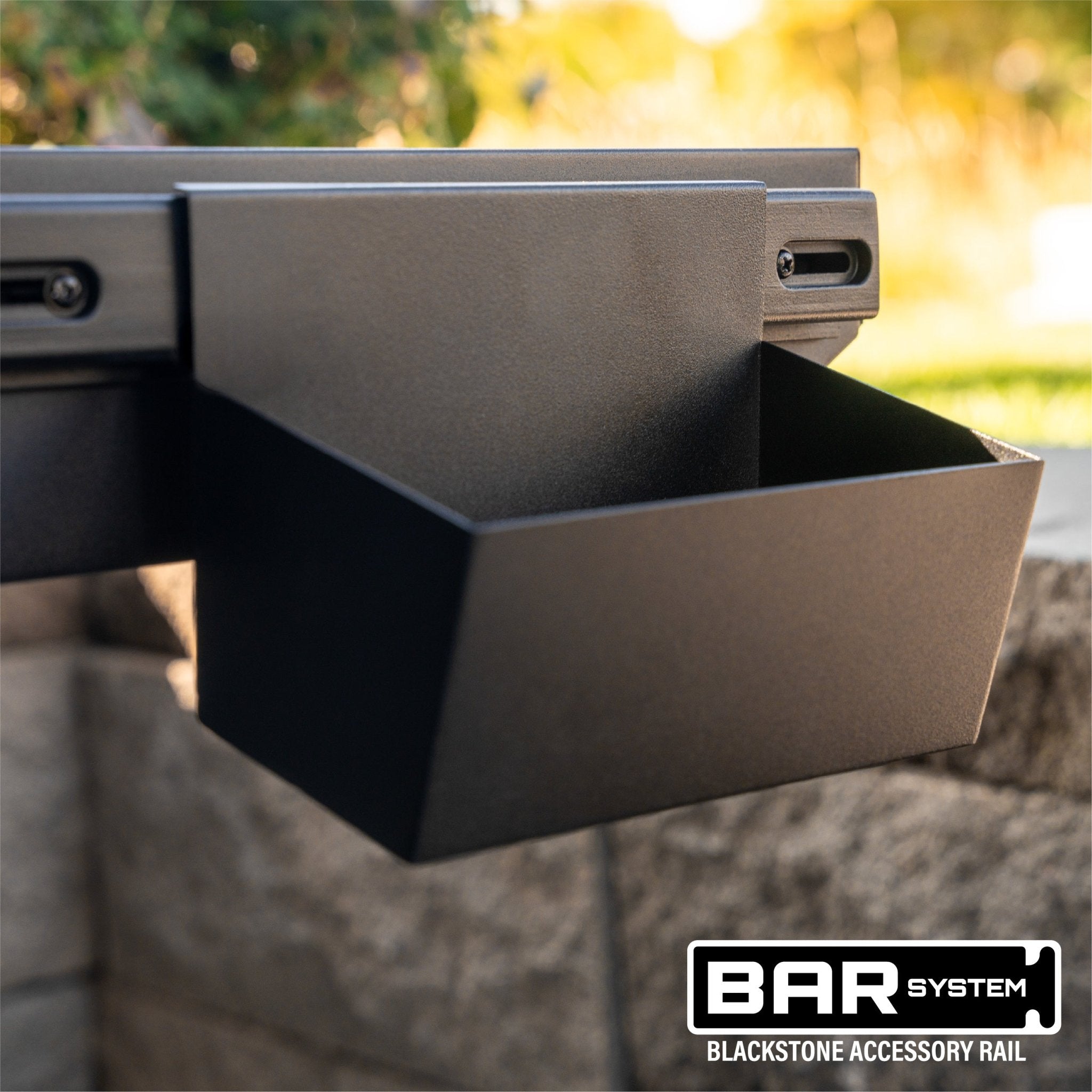 The included accessory bin clicks onto the side shelf BAR System and is perfect for holding your seasonings or squeeze bottles. 