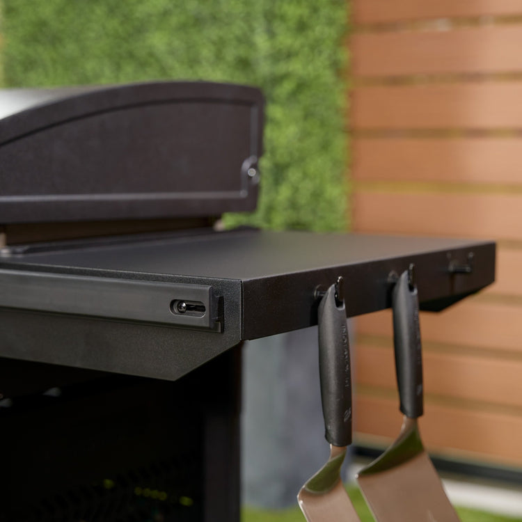 Side shelf hooks make the perfect place to hold your tools when not in use. 