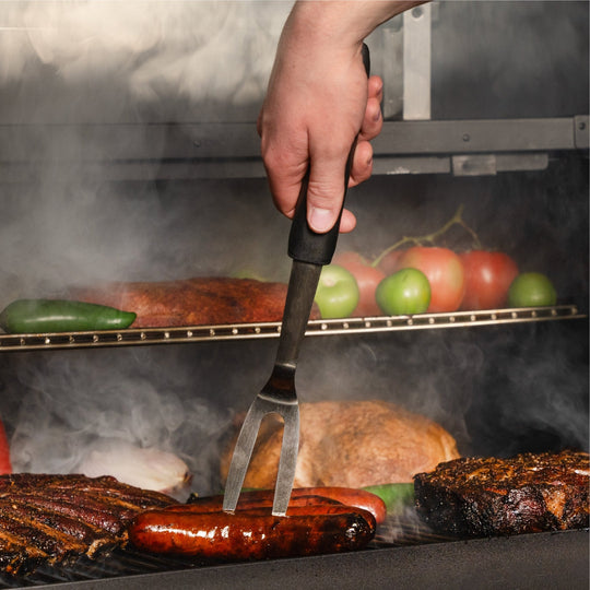 The carving fork is perfect for removing cuts of meat like hot dogs or sausages. 