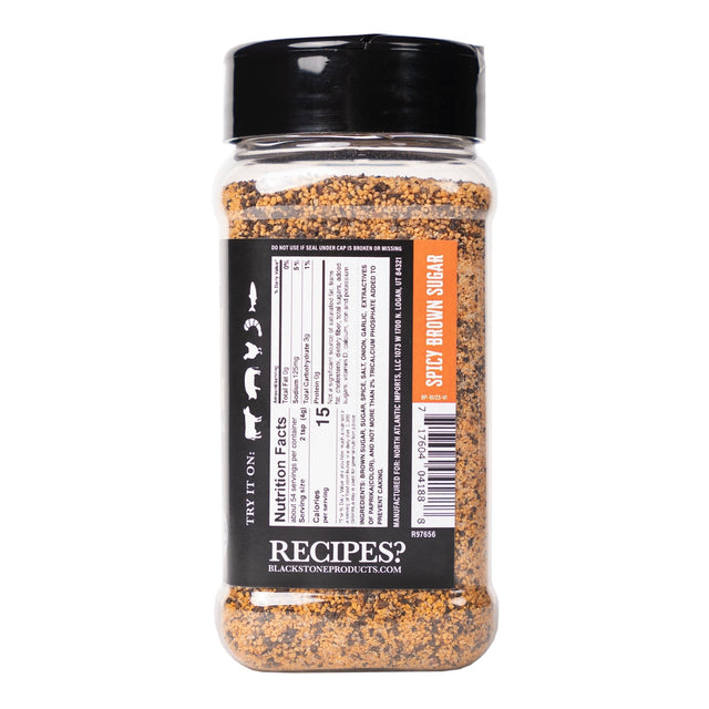 Back view of a Blackstone Spicy Brown Sugar seasoning bottle showing the nutrition facts, ingredients, barcode, and product information label.