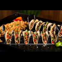 Six tacos in each taco rack. 